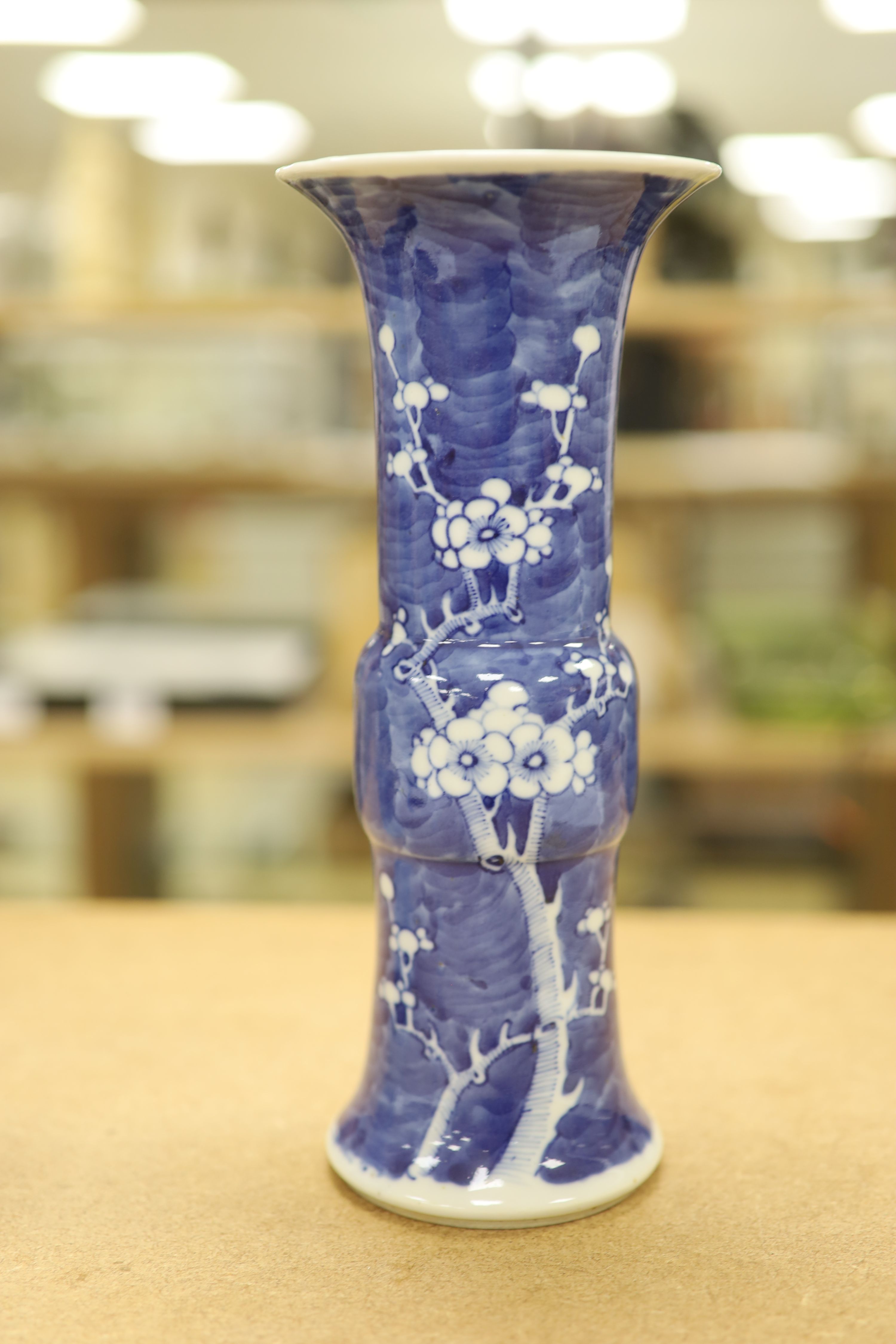 A pair of late 19th century Chinese blue and white prunus vases